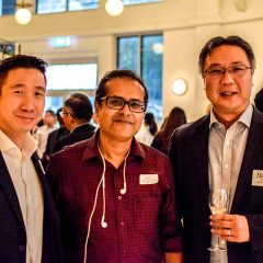 Group CEO Edmund Lee and Business Development Aaron Tan engaging with a client