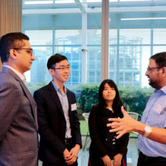 Attendee speaking with EDB representatives