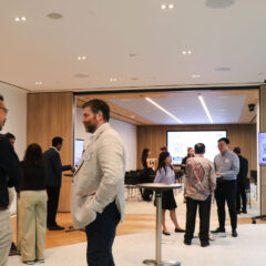 Attendees networking after the event