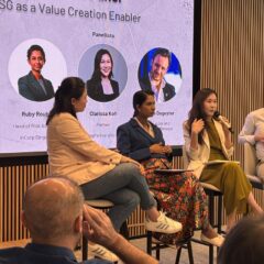 Moderator and Speakers in the middle of a discussion