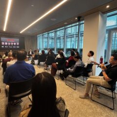 Attendee raising a question during the Q&A portion