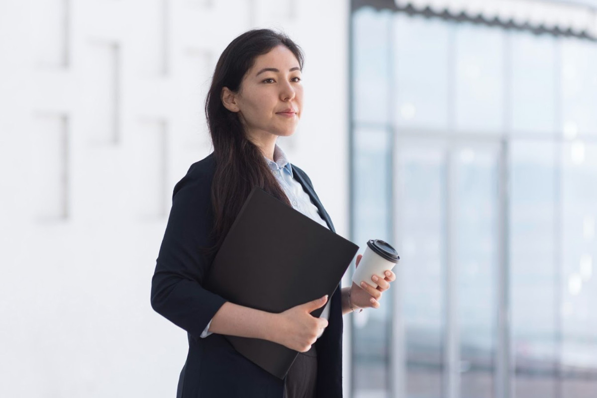 Core Pillars of ACRA Compliance A business professional updating statutory registers, including the Register of Directors and Members, on a laptop.