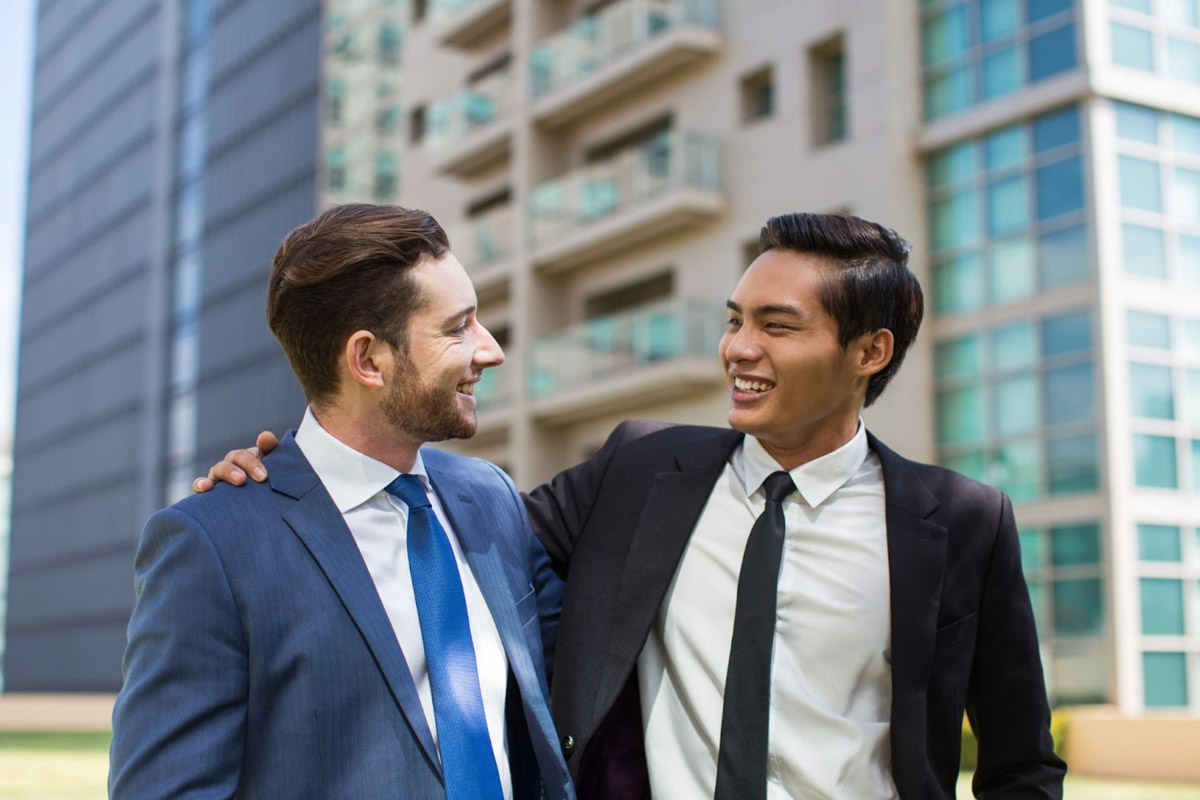 Employment Pass Rejected: Appeal Guide An immigration expert advising a client on the strategy to appeal a rejected employment pass, pointing to key areas on a document