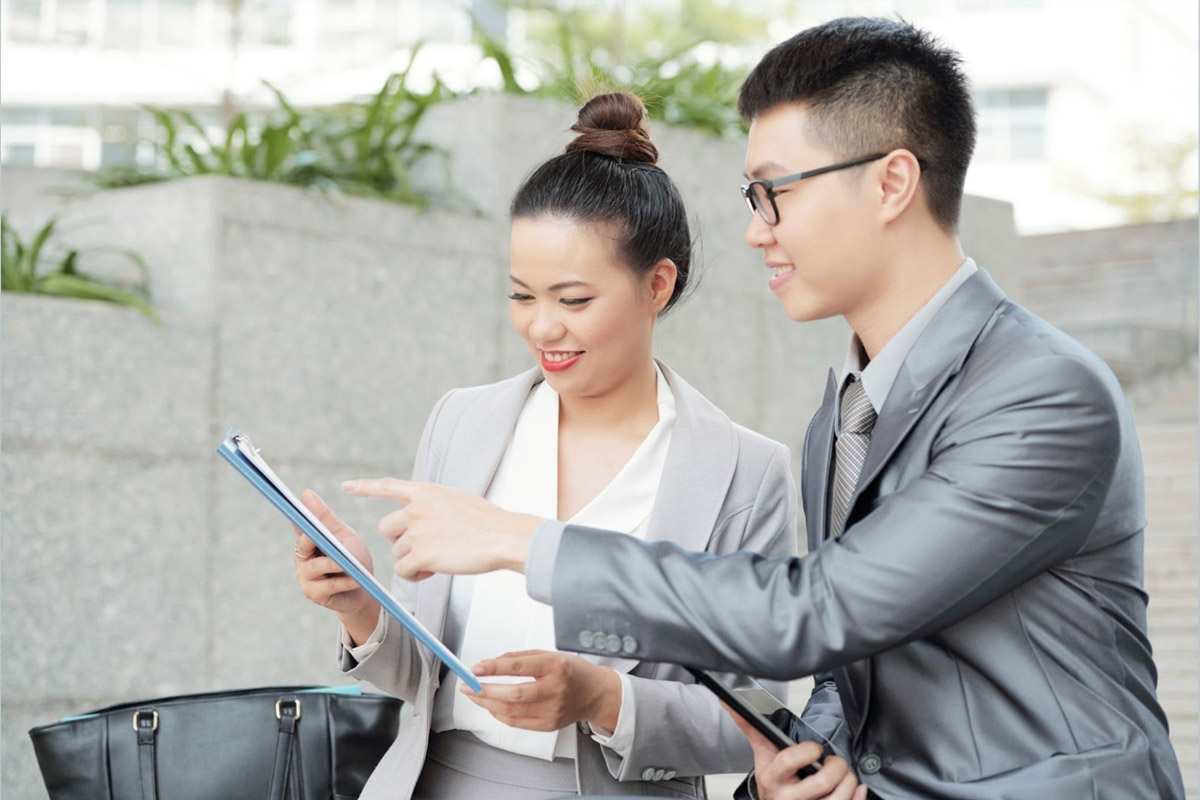 Importance of Financial Year End (FYE) in Singapore A tax consultant preparing corporate tax returns for submission to IRAS.