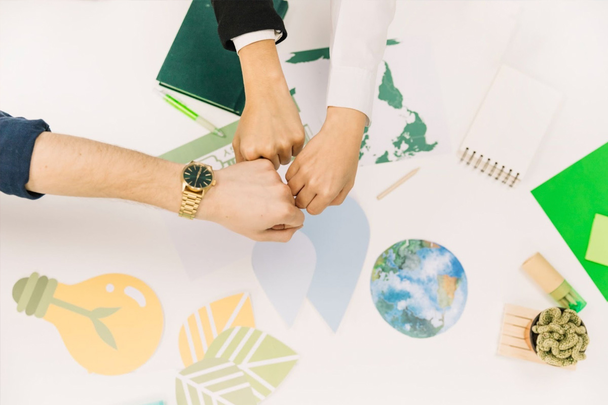 Social Enterprise Team Collaboration A diverse team collaborating in a modern office, representing the spirit of a social enterprise.