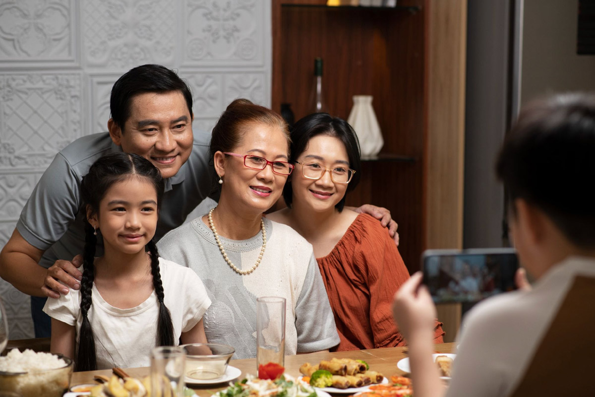 Family office founder signing documents to qualify for the licensing exemption Singapore